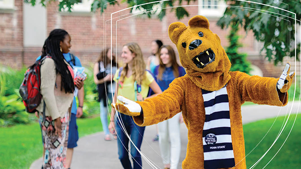 Nittany Lion standing with students 